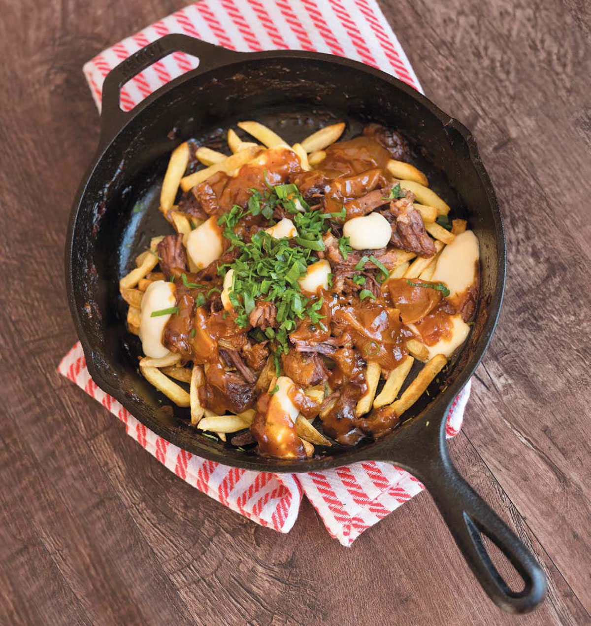 Braised short rib poutine from Two Rivers Brewing Company, from the cookbook Tasting Pennsylvania